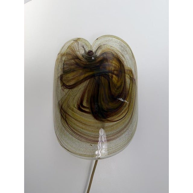 Exceptional Danish art glass wall lamp designed by Per Lütken for Holmegaard. Known as “Glassplattelampet”, the lamp...