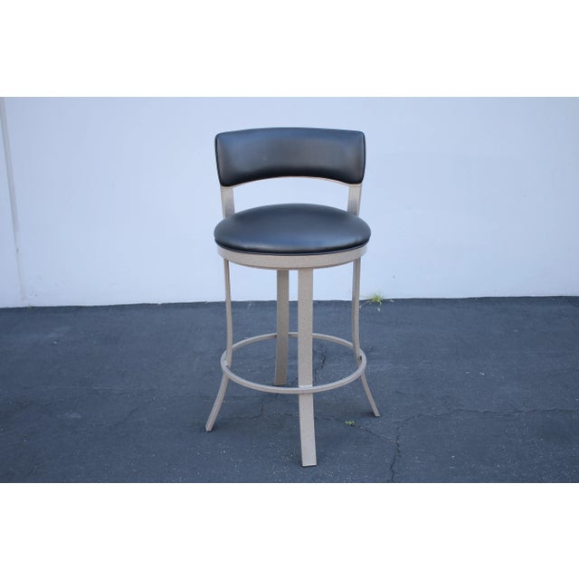Radiating a relaxed yet sophisticated vibe and showcasing impressive functionality, the Bali swivel bar stool by Wesley...