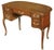 Elegant and timeless walnut and tooled brown leather top curved front five drawer desk or writing table from Sligh....