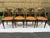 A set of four matching oak dining chairs by Jack Van der Molen for Jamestown Lounge Co. Each chair features a solid oak...