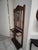 This is a quintessential arts and crafts style hall tree with a small mirror and made from oak. This piece is small and...