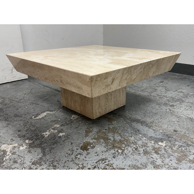 Design Plus Gallery presents a Travertine Reverse Bevel Coffee Table. Carved from travertine, this piece has a bold...