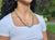 This exquisite necklace features nephrite from New Zealand, sourced from the renowned company Tuarangi Jade Jewellery. In...