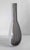 We are selling this pretty Mid-Century Modern art glass. This Italian Murano glass type bottle vase has black and white...