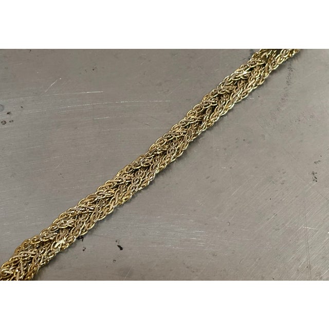 1970s-80s gold-tone braided chain bracelet. Excellent condition.
