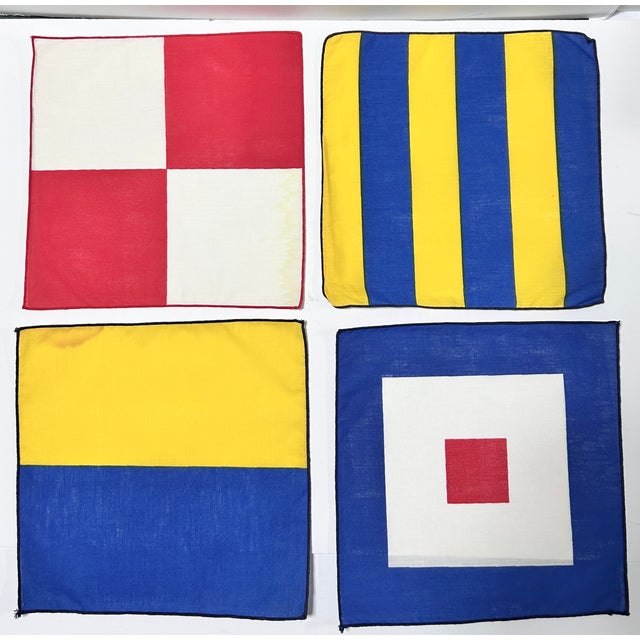 Vintage Leacock “Nautical Naps” cocktail napkins designed by Dessin Deux, featuring colorful International Code of Signals...