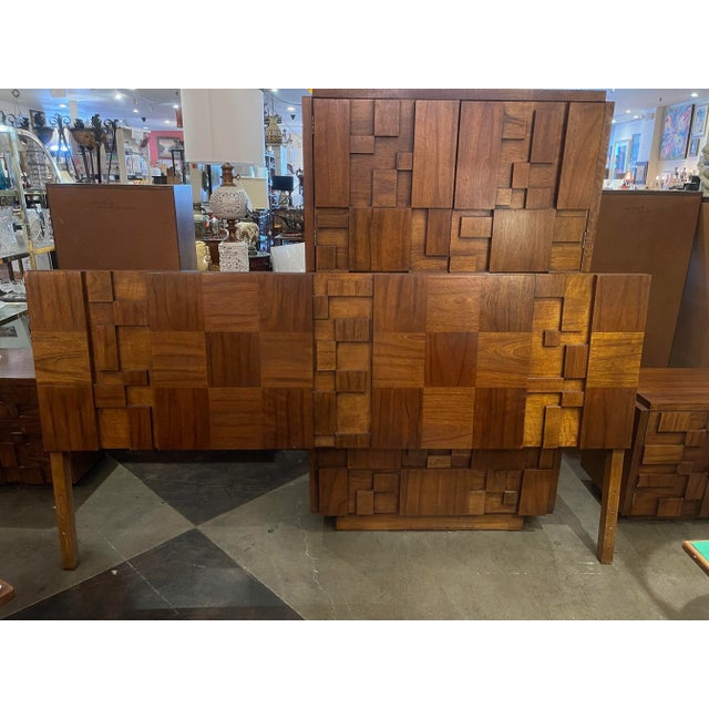 Transform your bedroom into a haven of mid-century sophistication with the Lane Staccato Brutalist Eastern/Standard King...