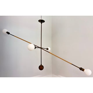 Apparatus Studio Tandem Highwire Chandelier in Aged Brass With Beige Leather Wrap For Sale