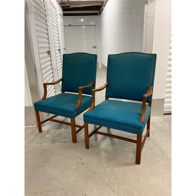 A stunning pair of mid-century modern lounge chairs that exemplify the elegance of 1950s Scandinavian design. These chairs...
