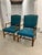 A stunning pair of mid-century modern lounge chairs that exemplify the elegance of 1950s Scandinavian design. These chairs...