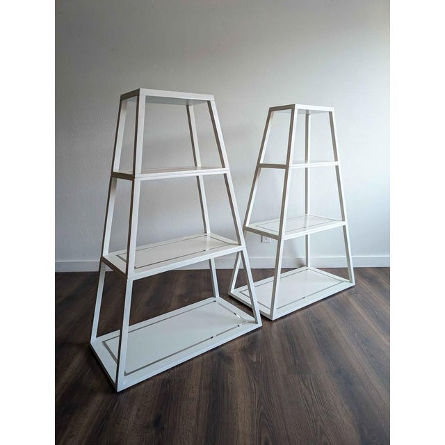Purchased brand new for our previous home, but since downsizing, these no longer fit. Beautiful pair of white pyramid...