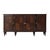 A credenza with feathered Paldoa veneers, a breakfront with a reeded edge top, with four recessed panel doors enclosing...