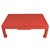 A chic Ming-style coffee table, wrapped in textured raffia and painted a vibrant red for a modern twist on a classic...