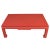 A chic Ming-style coffee table, wrapped in textured raffia and painted a vibrant red for a modern twist on a classic...