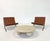 Pair of brown leather barcelona chairs by Mies Van Der Rohe for Knoll. This piece is attributed to the mentioned...