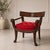 This is the Theodore Alexander interpretation of a Thomas Hope classic. An English Regency-style mahogany armchair, the...