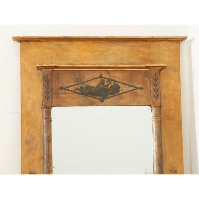 This Dutch trumeau is a fantastic find, crafted during the 1790’s, it retains its original mercury mirror plate within a...