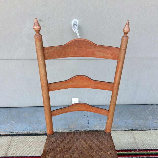 Antique American Salmon Painted Ladderback Side Chair with Split Oak Seat, Circa 1820s A wonderfully characterful and...