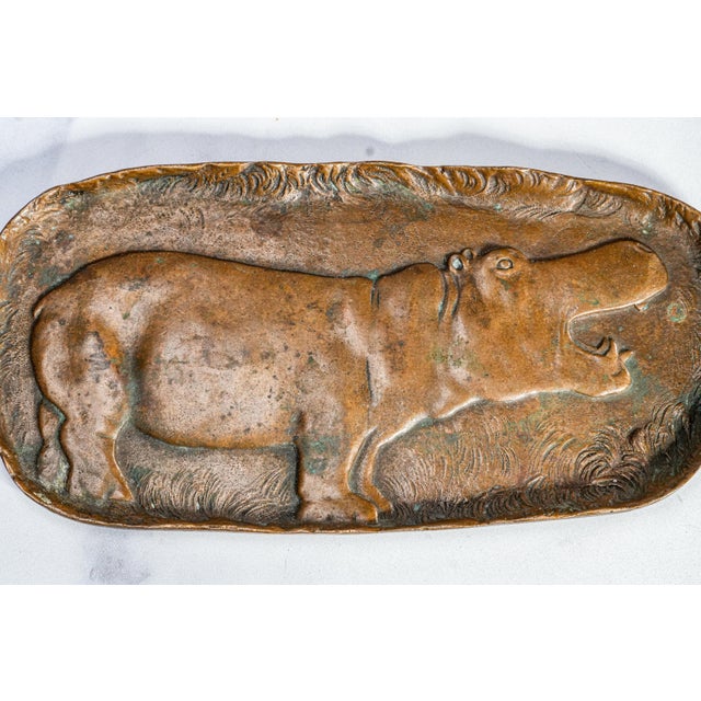 This exceptional Art Nouveau solid bronze catchall tray, dating to circa 1900, features a beautifully modeled hippopotamus...