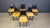 Set of 6 black leather dining chairs with newly upholstered yellow fabric chairs. beautiful sleek and timeless design. The...