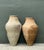 This pair of monumental Turkish terracotta vessels exudes a timeless, architectural presence, perfect for adding a sense...