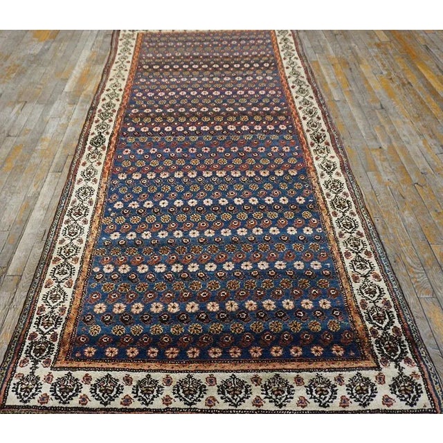 Handwoven antique NW Persian carpet. Woven circa 1890 (late 19th century). Rug size 4'2" x 8'7". Informal design featuring...