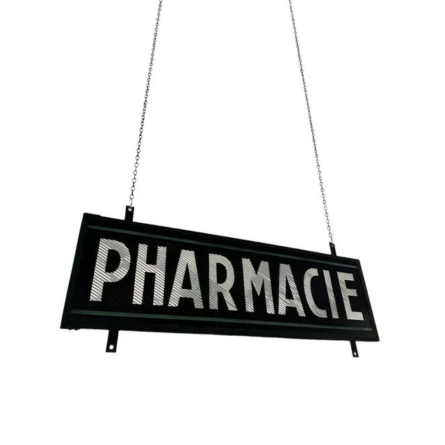 - A beautiful and rare double sided glass 'Pharmacie' sign mounted in its original frame, France circa 1930. - The sign is...