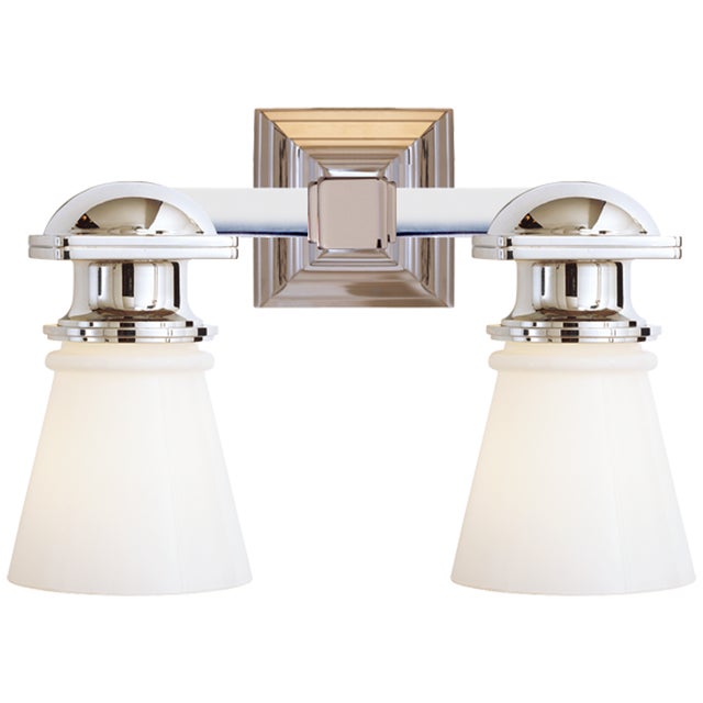 New York Subway Double Light in Polished Nickel with White Glass Designer: Chapman & Myers Height: 9.75" Extension: 8"...