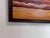 This captivating original oil painting on canvas portrays a solitary nude female figure gazing into a fiery, glowing...