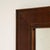 This piece presents as a mirror, distinguished by dark walnut frame, rectangular. Dating to 19th Century and originating...
