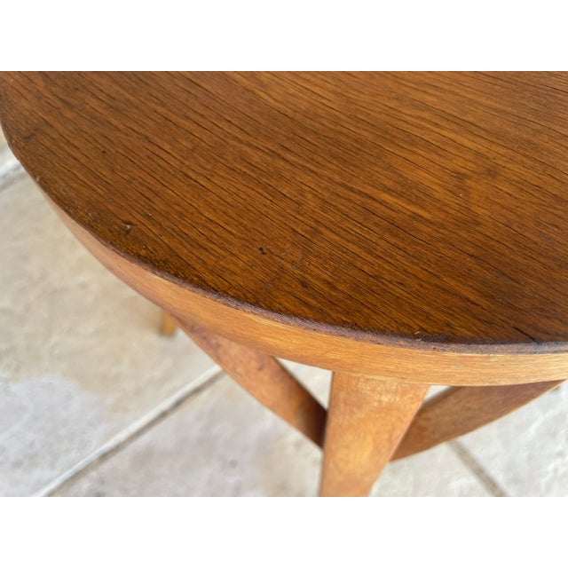 Mid-century, vintage, "Model #92" stool by Baumann, France, from the 1950's. Piece is made of beech, with a beautiful...