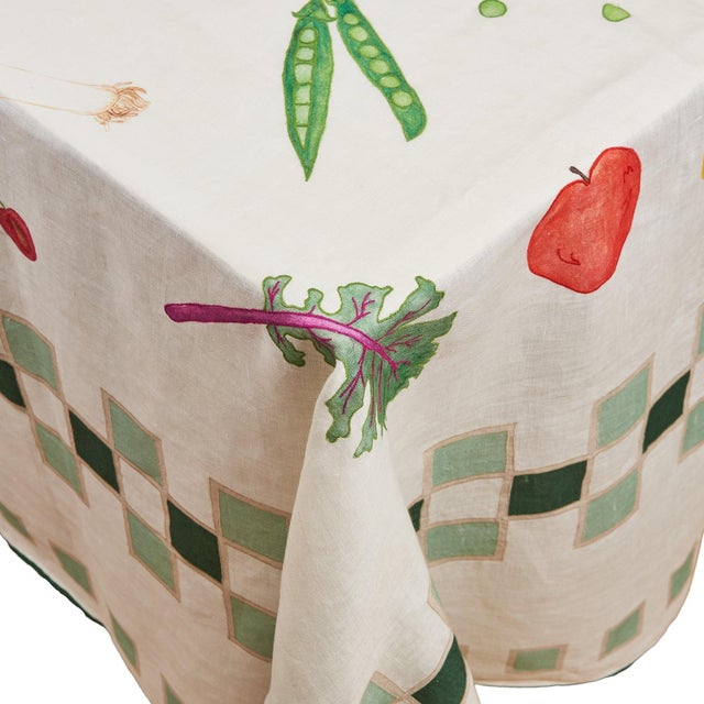 The kitchen garden comes to life in this stunning, timeless embroidered tablecloth that features vibrant fruit and...