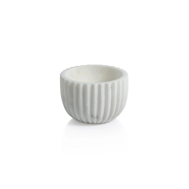 The Mulhouse Ribbed Marble Bowl set is the perfect one-of-a-kind piece that will add texture to any styling space. With...