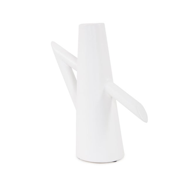 A beautiful collection of matte white ceramic vases were designed with a strong Scandinavian influence. The simple yet...