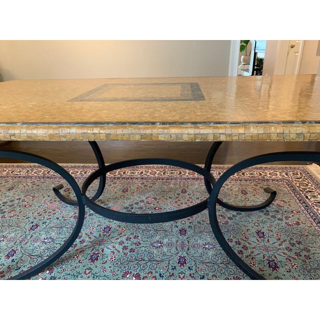 An incredible mosaic table from Arhaus Furniture, this striking rectangular piece features approximately 15,000 hand-cut...