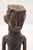 A striking pair of carved female figures from Tanzania, dating to the 1940s–1950s. Finely sculpted with delicate facial...