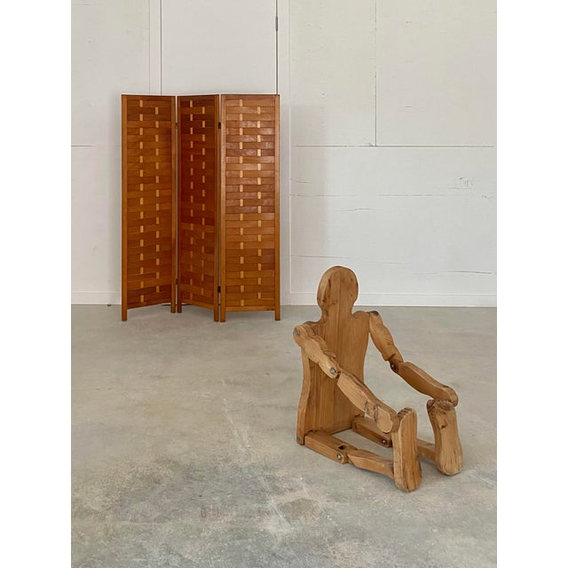 Handsome pine woven wood Midcentury folding screen 3-panel room divider. It is in wonderful vintage condition. Comprised...