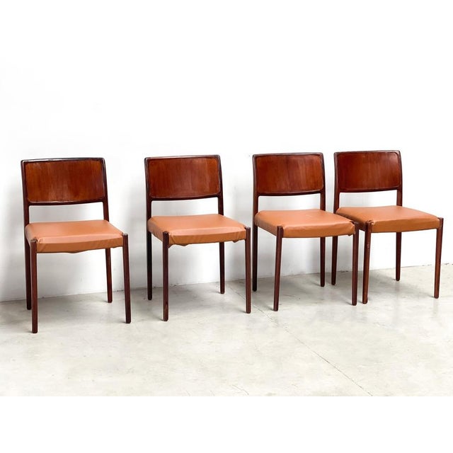 Vintage wooden dining chairs made in Denmark. Wooden frames with cognac faux leather upholstery 1970s - Denmark Good...