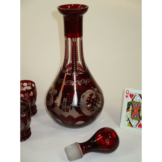 Rococo Early 20th Century Bohemian Decanter 6 Liquor Tumblers Red Glass Hand Wheel Engraved Czech For Sale - Image 3 of 11