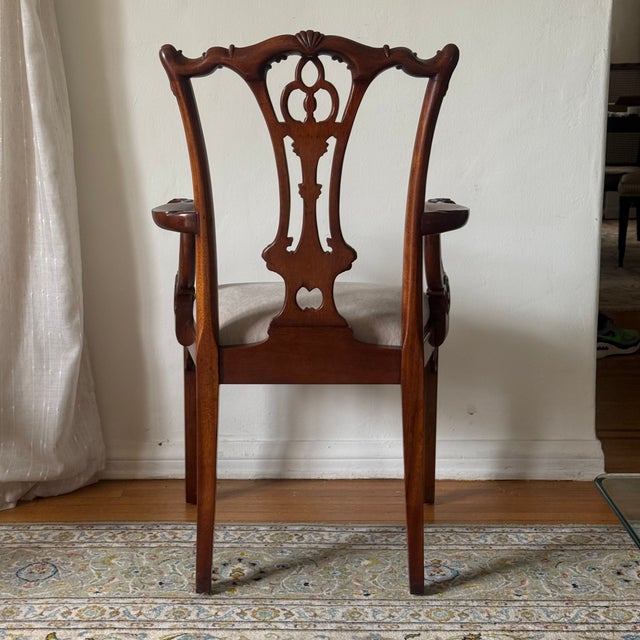 Vintage Chippendale dining chairs by Maitland-Smith. Set includes six side chairs and two armchairs. Crafted from carved...