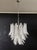 Huge Italian vintage Murano chandelier made by 41 glass petals (transparent and white “lattimo”) in a chrome frame....