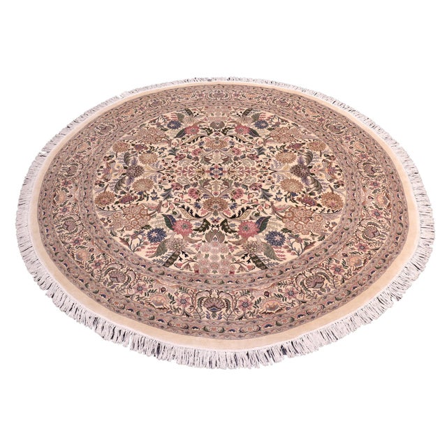 This hand‑knotted Pak Persian round rug showcases the finest expression of traditional Persian artistry. Each piece is...
