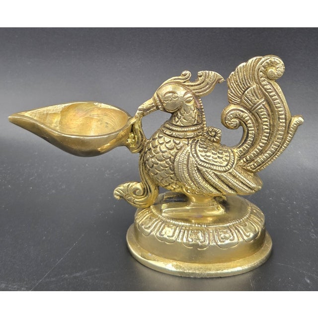 This is a beautifully handcrafted Brass Deepam (or Diya) oil lamp. Mid to Late 20th Cent style. These lamps are crafted...