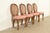 A gorgeous set of four French Regency Louis XVI style dining chairs By Drexel USA, Circa 1960s Carved walnut frames, with...