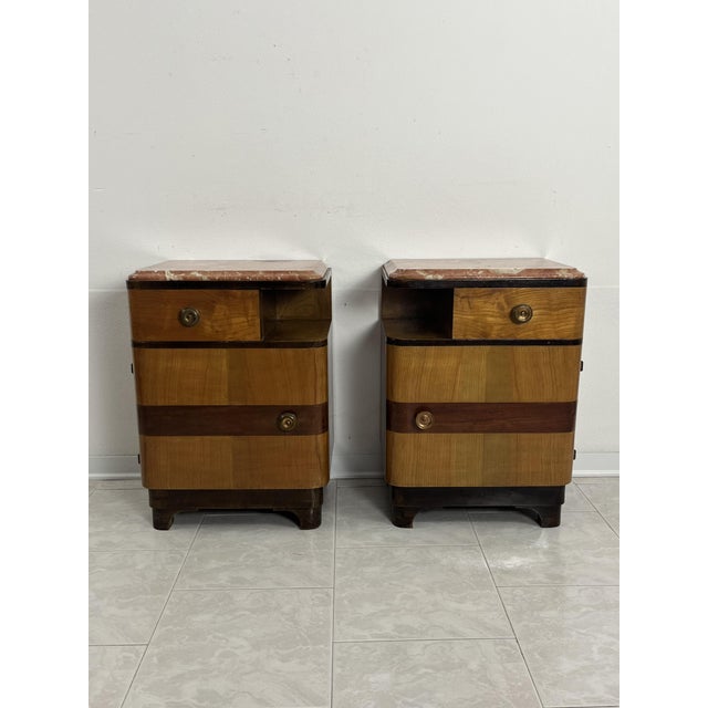 Set of 2 Art Deco wood and marble bedside tables from the 1940s. Belonging to my great-grandparents, they have a drawer...