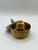 Vintage solid brass trinket box with a domed lid, engraved banding, and decorative finial. Made in India, this versatile...