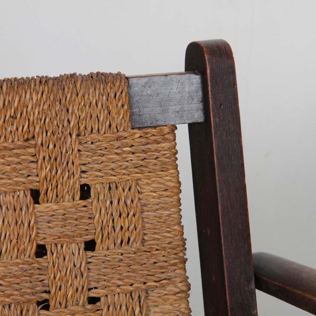 This pair of armchairs is reminiscent of the work of Adrien Audoux and Frida Minet. The frame is solid oak. The seat and...