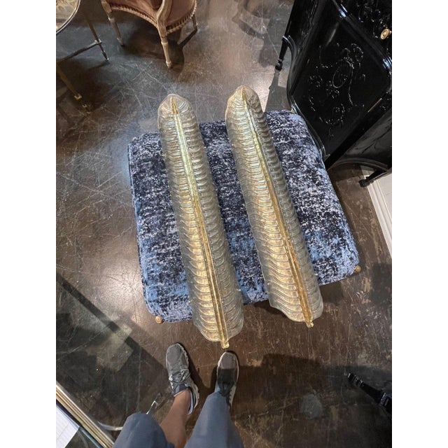 Exceptional large scale leaf form Murano glass sconces in a beautiful shimmering gold. Makes a very impressive statement!