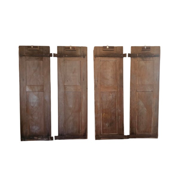 Two matching pair of early American pine shutters- scrubbed pine look. Some hardware attached, forged hinges, wood pegged....