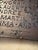 Name Recognition is a bronze sculpture in the form of an open book. Its two pages are etched with a list of artists’ names...
